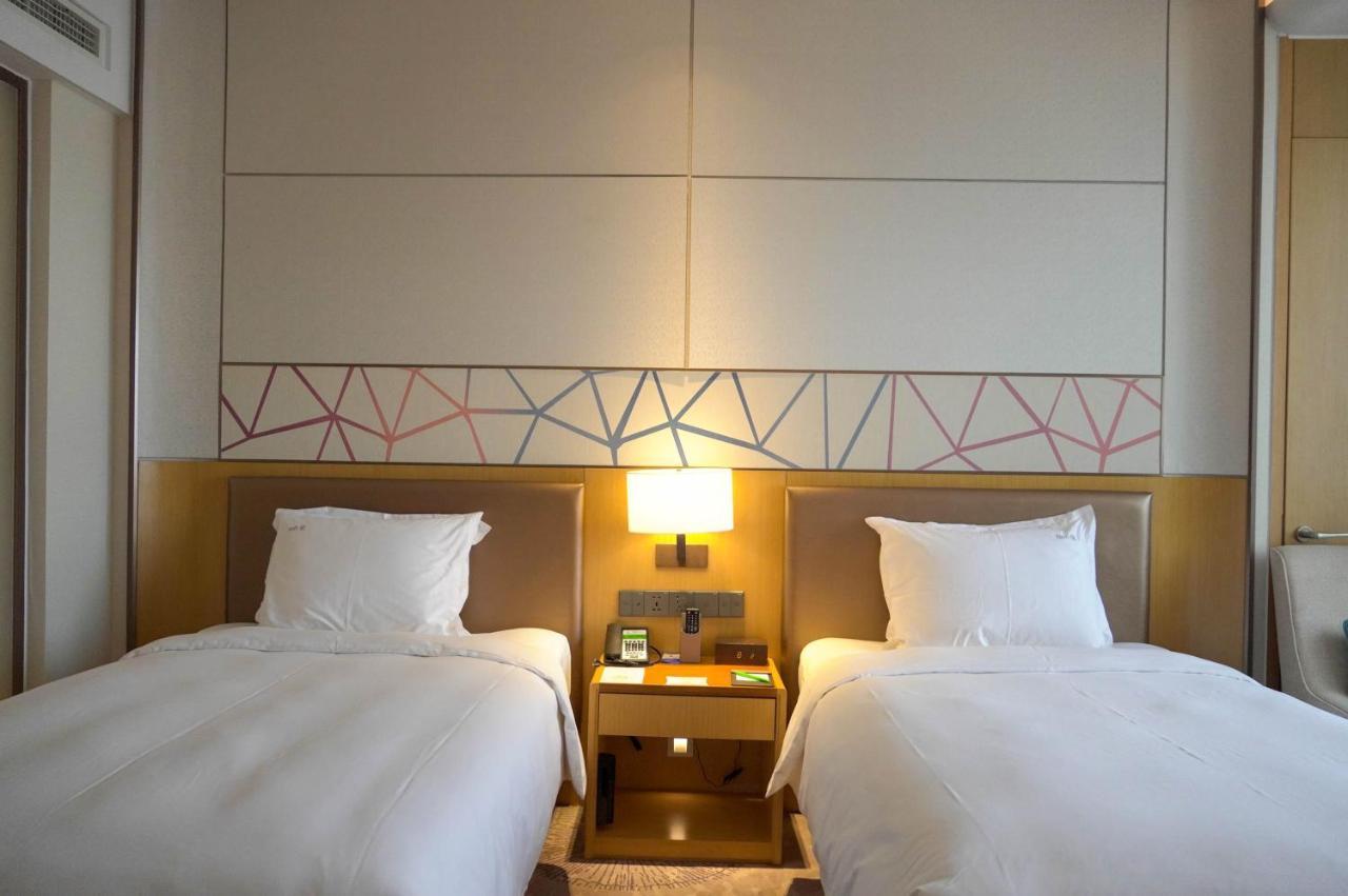 Holiday Inn Tianjin Xiqing By Ihg Екстер'єр фото
